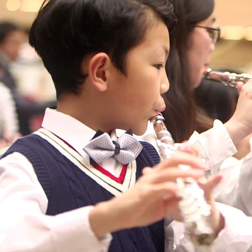 young flute player